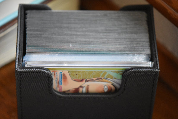 Graded One Piece Leader Enel inside a black Ultimate Guard deckbox along with deck and DON!!.
