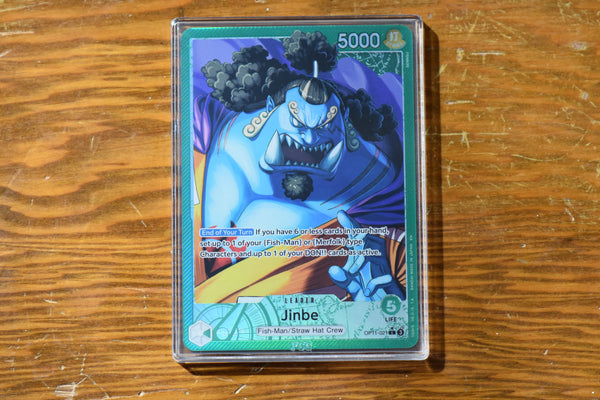 Detailed front view of One Piece Leader Jinbe encased in a PCG Slim Player Slab.