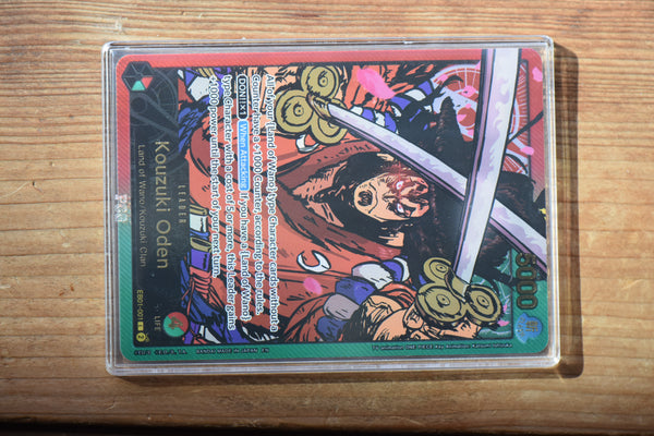 Kouzuki Oden (SP) PCG 9.5 Gem Mint in a Slim Player Slab on wood shelf - face on view