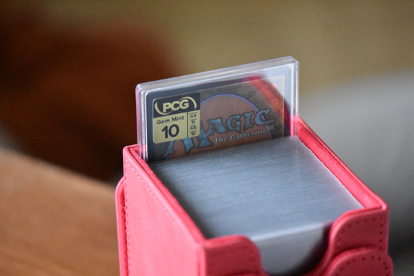 Nekusar Borderless PCG 10 Gem Mint in a Slim Player Slab inside a red deckbox - back view