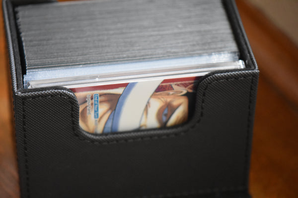 Edgar Newgate Leader Slim Player Slab inside an Ultimate Guard deckbox.