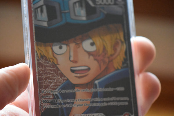 Sabo 004 Alt Art PCG 9.5+ in a Slim Player Slab - closeup angle