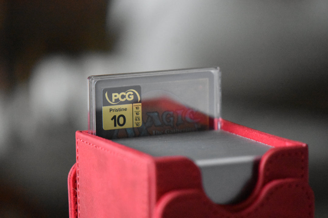 A PCG 10 Pristine Slim Player Slab inside of a Gamegenic XL Squire red deckbox with an EDH deck.
