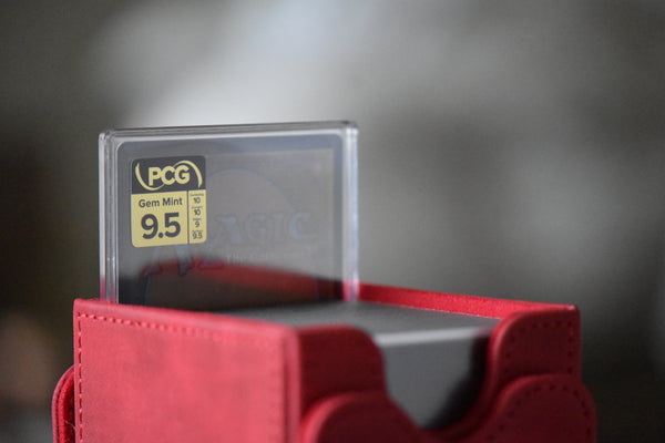 Ardyn the Usurper Surge Foil PCG 9.5 in a Slim Player Slab and red deckbox - back view