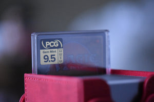 Atraxa Praetors Voice PCG 9.5 Gem Mint in a Slim Player Slab and red deckbox - back view