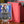 Graha Tia PCG 9.5 Gem Mint in a Slim Player Slab next to a red deckbox - front view