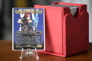 Graha Tia PCG 9.5 Gem Mint in a Slim Player Slab next to a red deckbox - front view