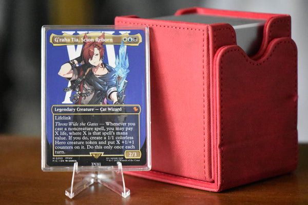 Graha Tia PCG 9.5 Gem Mint in a Slim Player Slab next to a red deckbox - front view