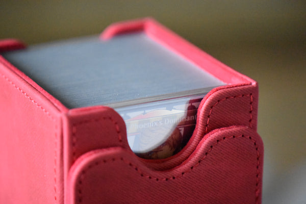 Joshua Phoenix PCG 10 Flawless in a Slim Player Slab inside a red deckbox - deckbox