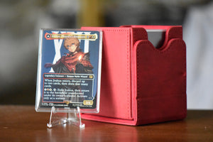 Joshua Phoenix PCG 10 Flawless in a Slim Player Slab next to red deckbox - front view
