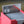 Kozilek Borderless PCG 9 Mint in a Slim Player Slab inside a red deckbox - back view