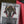 Kozilek Borderless PCG 9 Mint in a Slim Player Slab next to a red deckbox - closeup angle