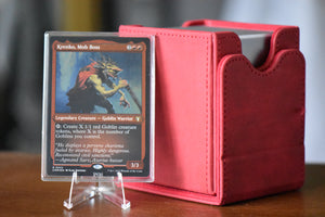 Krenko Foil Etched PCG 9.5 Gem Mint in a Slim Player Slab next to a red deckbox - front view