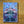 Kyros Alt Art Leader in a PCG 10 Slim Player Slab in full sun on wooden table.