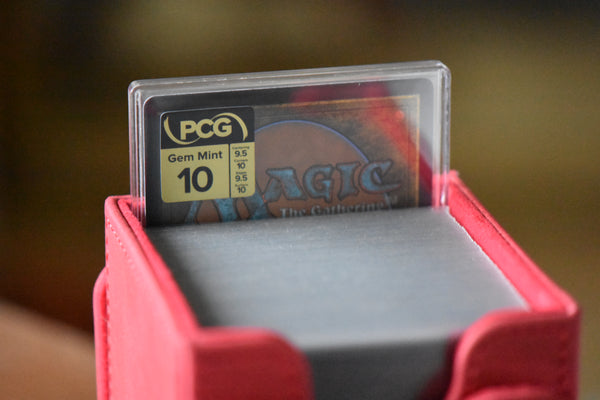 Lightning Borderless PCG 10 Gem Mint in a Slim Player Slab inside a red deckbox - back view
