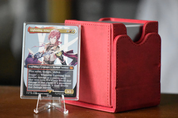 Lightning Borderless PCG 10 Gem Mint in a Slim Player Slab next to a red deckbox - front view