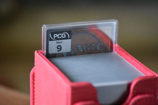 Meren Borderless PCG 9 Mint in a Slim Player Slab inside a red deckbox - back view