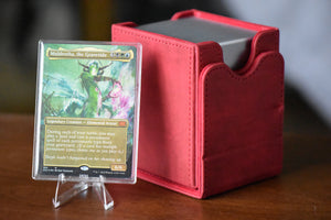 Muldrotha Borderless PCG 9 Mint in a Slim Player Slab next to a red deckbox - front view