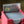 Niv-Mizzet Borderless PCG 9.5 Gem Mint in a Slim Player Slab inside a deckbox - back view