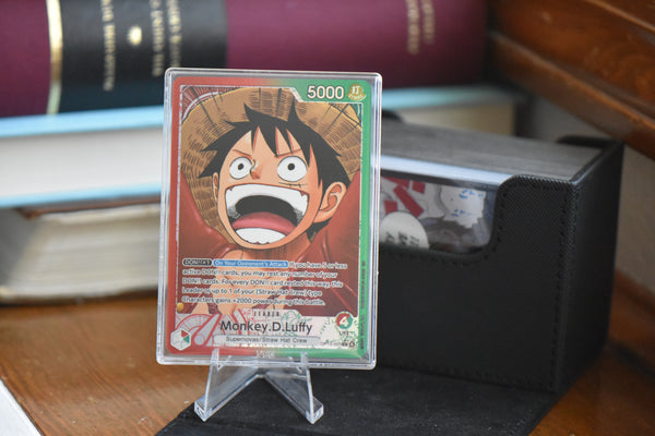 OP13 Luffy Alt Art PCG 10 in a Slim Player Slab in front of a black Sidewinder deckbox.