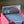 Oloro Judge Promo PCG 9 Mint in a Slim Player Slab inside a red deckbox - back view