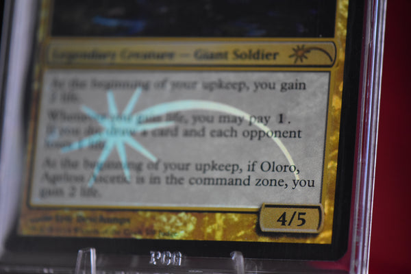 Oloro Judge Promo PCG 9 Mint in a Slim Player Slab - closeup angle