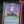 The Ur Dragon Rainbow Foil PCG 9 Mint in a Slim Player Slab - closeup