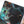 Angled closeup of a Trafalgar Law Alt Art Leader in a PCG Slim Player Slab.