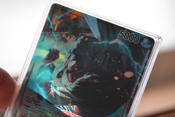 Angled closeup of a Trafalgar Law Alt Art Leader in a PCG Slim Player Slab.