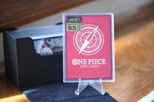 Trafalgar Law Alt Art Leader PCG 9.5 Slim Player Slab next to deckbox - back of card