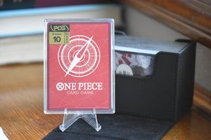 Vivi Alt Art PCG 10 Pristine in a Slim Player Slab next to a black deckbox - back.