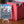 Yshtola Rhul PCG 9.5 Gem Mint in a Slim Player Slab next to a deckbox - front view