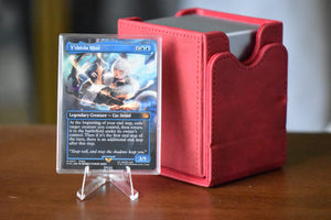 Yshtola Rhul PCG 9.5 Gem Mint in a Slim Player Slab next to a deckbox - front view